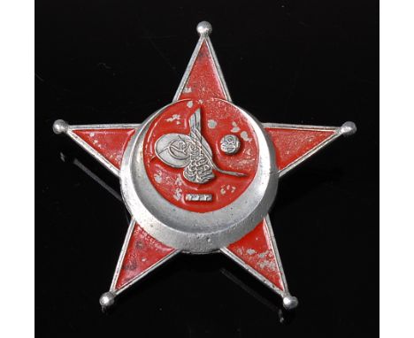 A Turkish War medal of 1915 or "Gallipoli Star" with pin back (looses to enamel.)