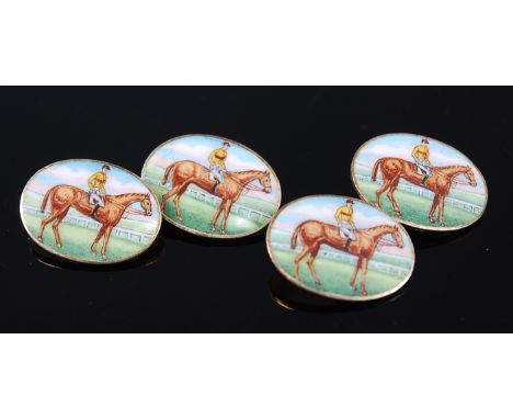 A pair of gentleman's 9ct gold cuff-links, each enamel decorated with a racehorse and jockey, maker J.W.B., Birmingham, 1984.