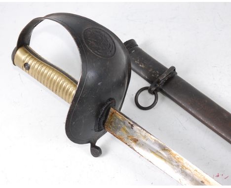 A circa 1900 Brazilian Calvalry Trooper's sword, having an 81cm slightly curved fullered blade marked to the forte AEC within
