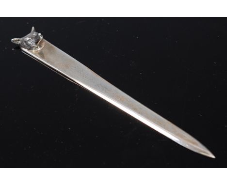 An E.R. II silver letter opener of plain tapering form, surmounted by a fox head, J.B. Chatterley & Sons Ltd, Birmingham, 195