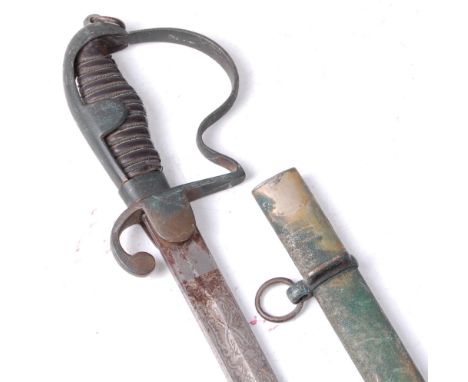 A WW II Turkish dress sword, the a 71.5cm slightly curved blade etched with a star and moon and marked to the back of the bla