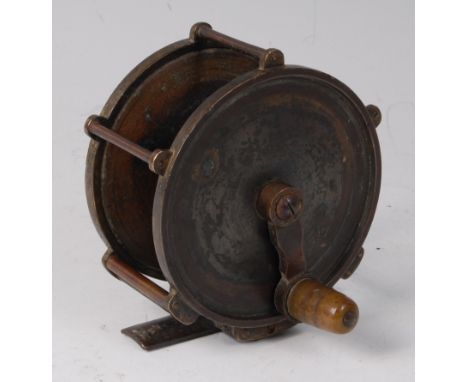 A Victorian brass 4" fly reel having anti-foul crank handle, raised roller pillars and threaded check housing, circa 1880.