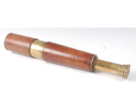 Taylor Taylor & Hebson of Leicester, a WW I lacquered brass and leather clad four drawer military telescope, stamped T.T. & H