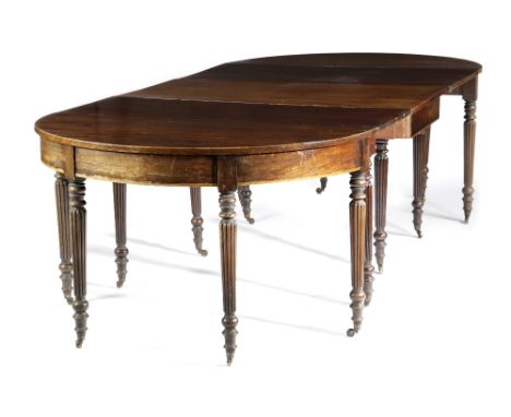 A REGENCY MAHOGANY EXTENDING DINING TABLE IN THE MANNER OF GILLOWS, EARLY 19TH CENTURY with a pair of 'D' ends and a central 