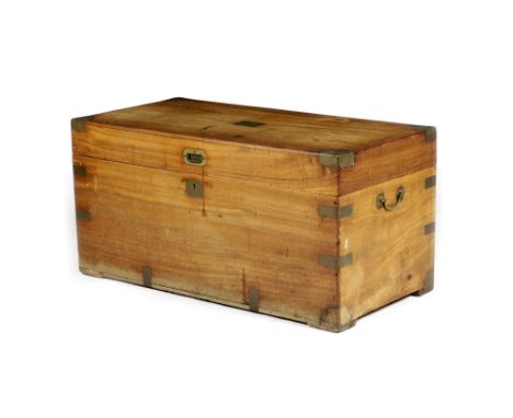AN ANGLO-CHINESE CAMPHORWOOD TRUNK LATE 19TH CENTURY with brass mounts and handles and a vacant interior 52.5cm high, 105cm w