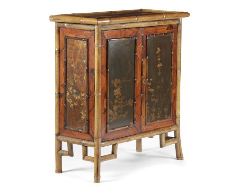 A JAPANESE BAMBOO AND PARQUETRY SIDE CABINET LATE 19TH CENTURY decorated with geometric motifs, with a pair of lacquered pane