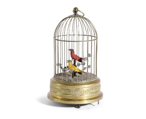 A FRENCH BRASS AUTOMATON SINGING BIRDS IN CAGE LATE 19TH / EARLY 20TH CENTURY with a clockwork mechanism and a suspension rin