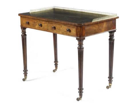 λ A GEORGE IV ROSEWOOD WRITING TABLE C.1820 the top with a brass baluster gallery and inset with a tooled leather writing sur