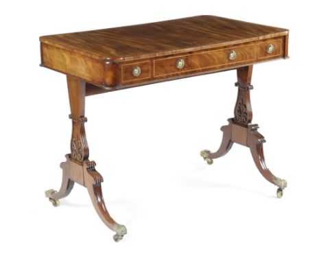 A REGENCY MAHOGANY GAMES TABLE EARLY 19TH CENTURY inlaid with boxwood stringing, the kingwood banded top with a reversible sl