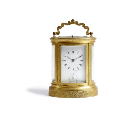 A FRENCH GILT BRASS OVAL CARRIAGE CLOCK LATE 19TH CENTURY the brass eight day repeating movement with a platform lever escape