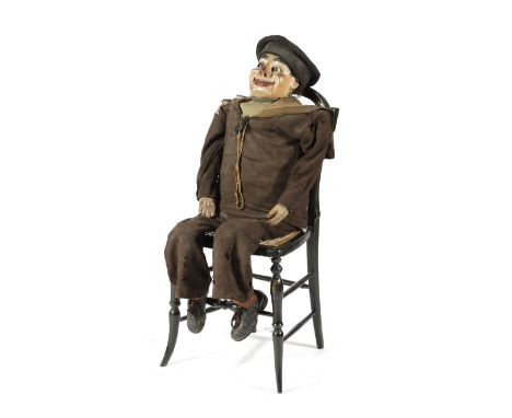 A VENTRILOQUIST'S DUMMY FIRST HALF 20TH CENTURY with a painted papier-mache head with an articulated mouth, dressed as a sail