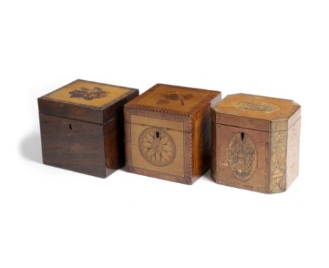 λ A GEORGE III HAREWOOD AND MARQUETRY TEA CADDY LATE 18TH CENTURY of cube form, inlaid with flowerhead paterae, the lid with 