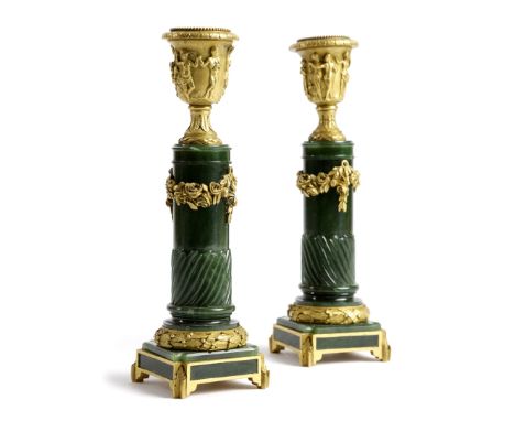 A PAIR OF NEPHRITE JADE AND ORMOLU CANDLESTICKS PROBABLY RUSSIAN OR ITALIAN, FIRST HALF 19TH CENTURY each with an urn shape s