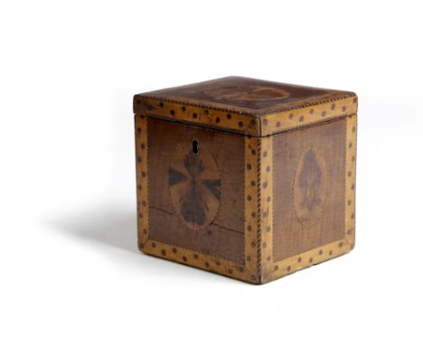 A GEORGE III HAREWOOD TEA CADDY LATE 18TH CENTURY of cube form, inlaid with oval blackthorn book matched panels, with barber'