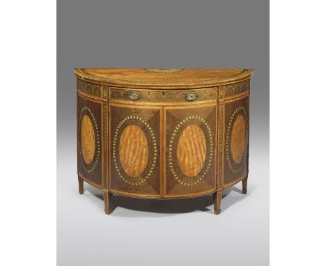 A FINE GEORGE III SATINWOOD AND PURPLEHEART SEMI-ELLIPTICAL COMMODE IN THE MANNER OF GILLOWS, C.1790 AND LATER with painted d