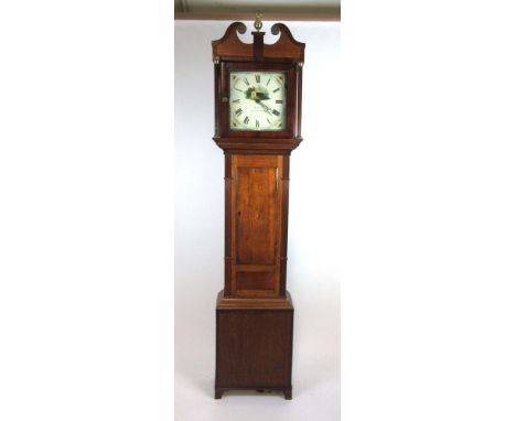 An 18th century oak and mahogany crossbanded longcase clock, the swan neck pediment over an enameled face with Roman numerals