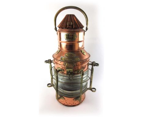 A large copper and brass ships mast head lantern, having brass labels reading Lord Line Ltd St Andrews Dock, No.2172, with ri