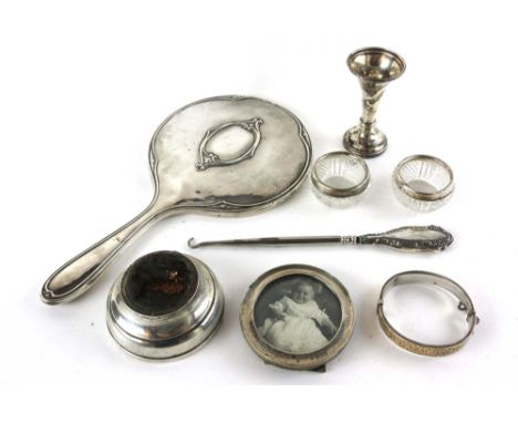 A small parcel of silver hallmarked items to include a dressing mirror, small circular photo frame, a bangle, a pen knife, sm