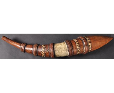 A 19th Century West African Sierra Leone Mande / Hausa people powder horn / powder flask having a shaped horn body with hand 