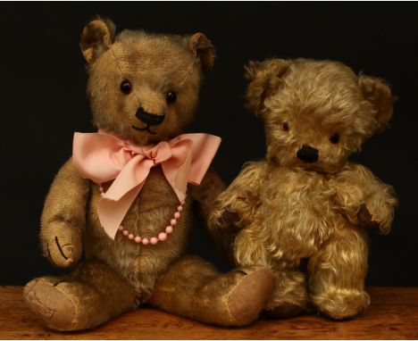 A 1930's Chad Valley novelty golden mohair jointed teddy bear, amber and black glass eyes, vertically and horizontally stitch