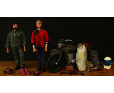 A late 1970's Palitoy Action Man, blonde flock hair, blue 'Eagle eyes' with mechanism, gripping hands, marked 'MADE IN ENGLAN