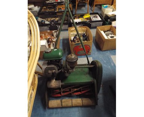 A Ramsomes Petrol Mower with Villier Engine Having Kick Start.