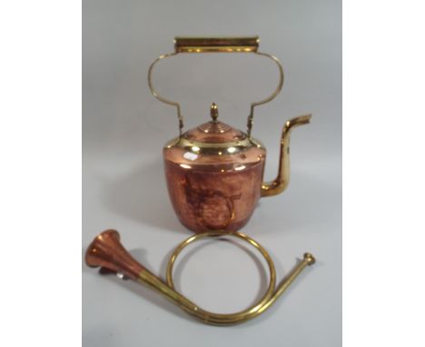 A Large Copper Kettle with Brass Handle and A Copper and Brass French Hunting Horn.