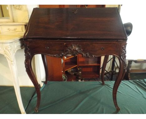 A Fall Front Ladies Writing Desk in Rosewood with Moulded Decoration, Two Short Drawers and Extended Cabriole Legs.