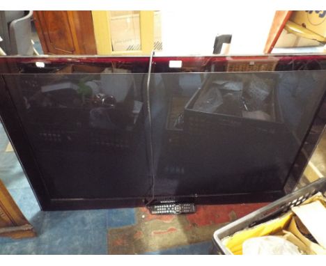 A Samsung 50" Flat Screen TV with Remove and Wall Hanging Bracket.