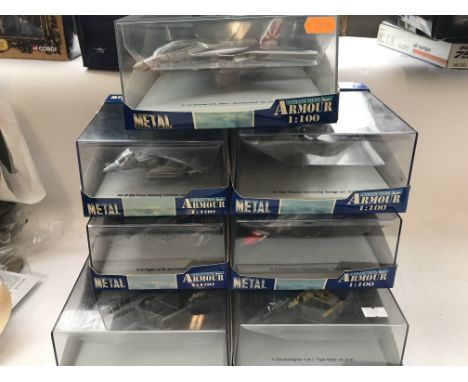 A collection of Collection Armour models. A AV-B Plus Marina, a F-14, a F-104, a F-5, F-4 and 2 other F-104s all boxed. Scale