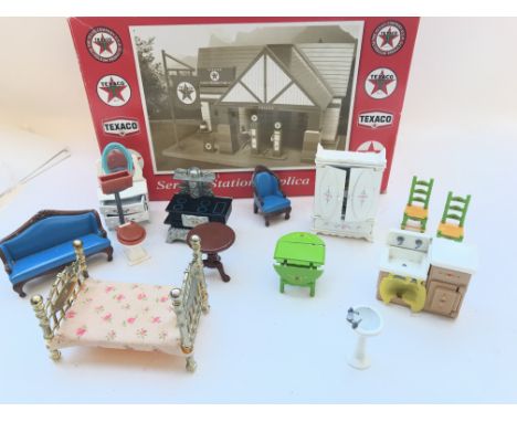 A collection of dolls house accessories and a boxed Texaco Old Timer Service station.