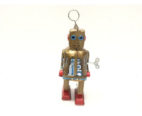 A Gold tinplate Space Robot.