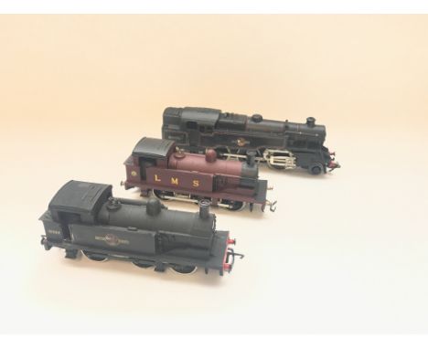 A Wrenn 0-6-0 Tank engine, a Hornby 2-6-4 Tank engine and aHornby 0-6-0 Tank engine (re-painted).
