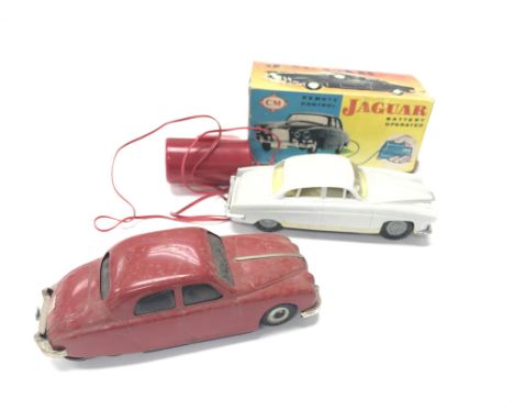 A vintage remote controlled Jaguar boxed and a mechanical "Startex" Jaguar 2.4.