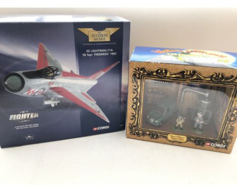 A boxed Corgi EE Lighting F1A #49401 and a Wallace and Gromit Animated Cell Certificated set both boxed.