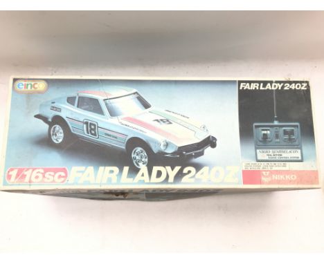 A Nikko 1/16 scale Fair Lady 240Z R/C Car boxed.