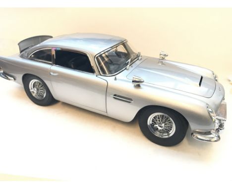 A 1:18 Scale Aston Martin DB5 as seen in Goldfinger boxed and complete with paper work, this is 1 of 200 only made.