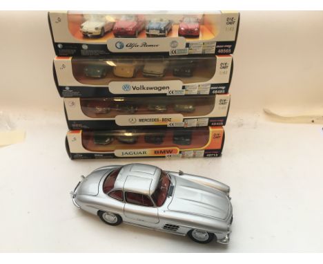 A collection of New-Way car packs Scale 1.43 and a Mini Champs Mercedes-Benz 300 SL . 1953 all boxed.