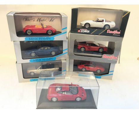 A Collection of Minichamps cars and 1 corgi boxed.1:43 scale.