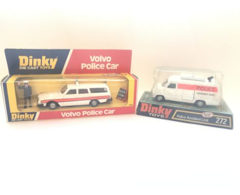 A Dinky Volvo Police Car boxed #243 and a Police Accident unit #272 boxed.