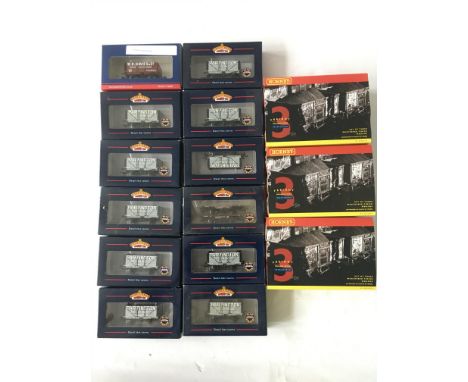 A collection of 12 boxed Bachmann OO gauge rolling stock and three boxed Hornby sets of three weathered finish wagons OO gaug