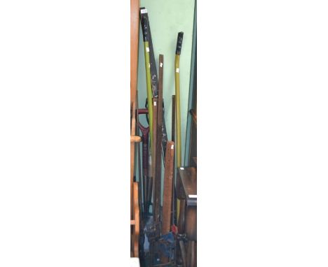 A quantity of sash clamps and general garden tools