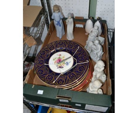 A quantity of Royal Worcester plates with a selection of figurines