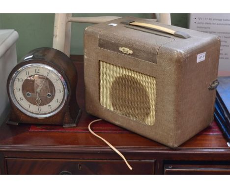 An oak cased mantel clock and a vintage Bush radio