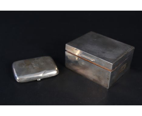 A silver cigarette box with engine turned decoration, Birmingham 1933 together with a silver cigarette case, total weight wit