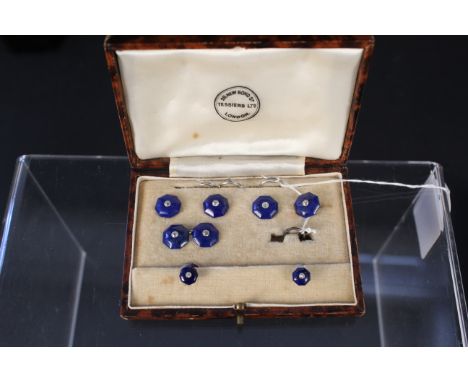 A 9ct gold and platinum lapis lazuli and diamond cufflink, stud and button set, each part consisting of an octagonal shape se