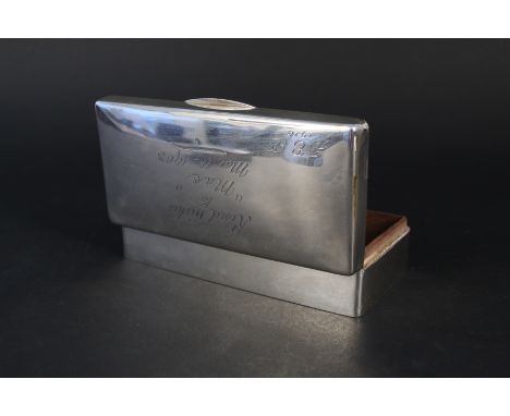 A large silver cigarette box with presentation inscription to lid (as found) hallmarked Birmingham by Walker &amp; Hall (mark