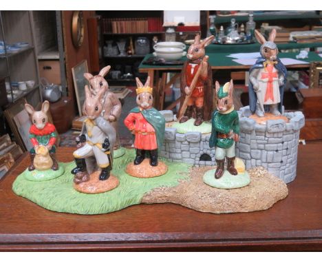 ROYAL DOULTON SET OF SEVEN GLAZED CERAMIC FIGURES- THE ROBIN HOOD COLLECTION, ON CERAMIC STAND 