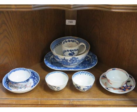 TWO EARLY ORIENTAL PATTERNED CERAMIC TEA BOWLS AND SAUCERS, TWO OTHER TEA BOWLS, SLOP BOWL ETC (SOME PIECES AT FAULT)