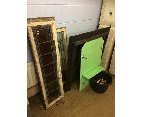 Cast iron fire surround, four leaded windows and a bathroom shelf